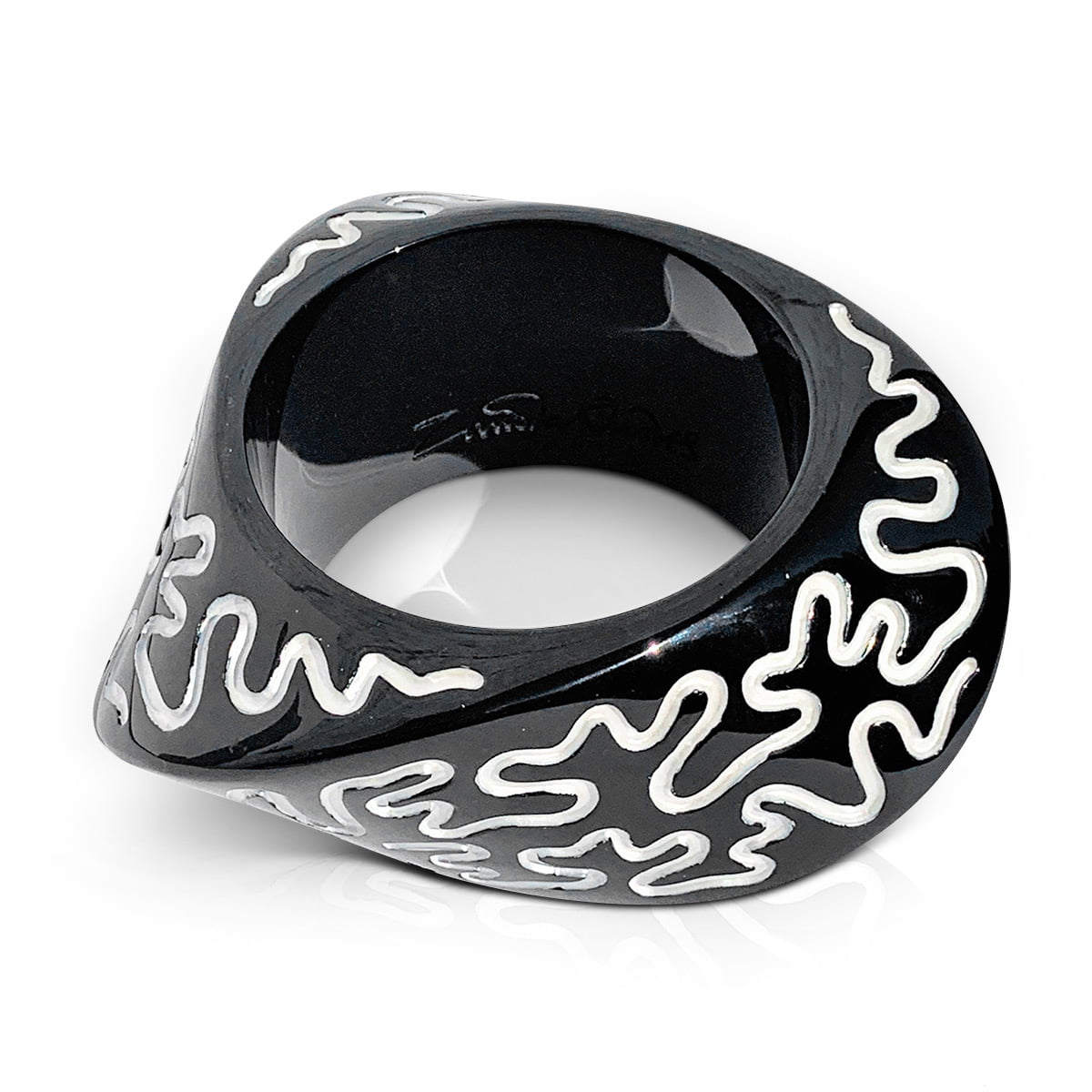 Black asymmetric bangle with Zandra’s famous white engraved squiggle.
