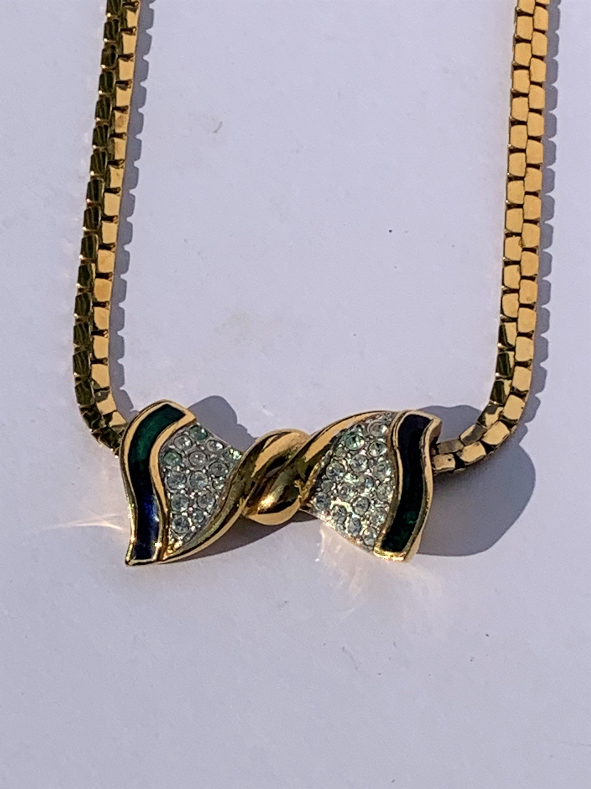 diamante and green enamel bow necklace