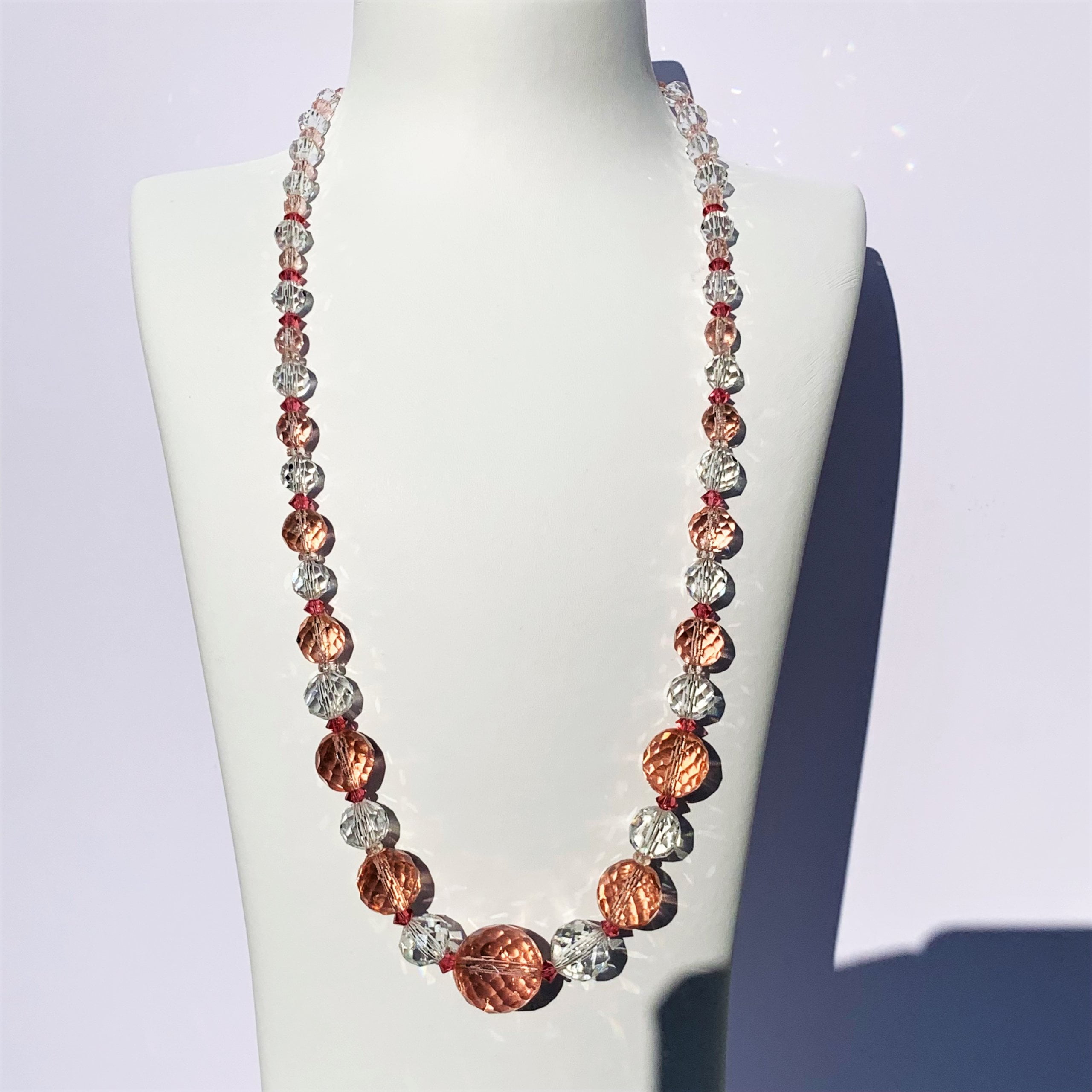 Peach crystal glass harlequin necklace